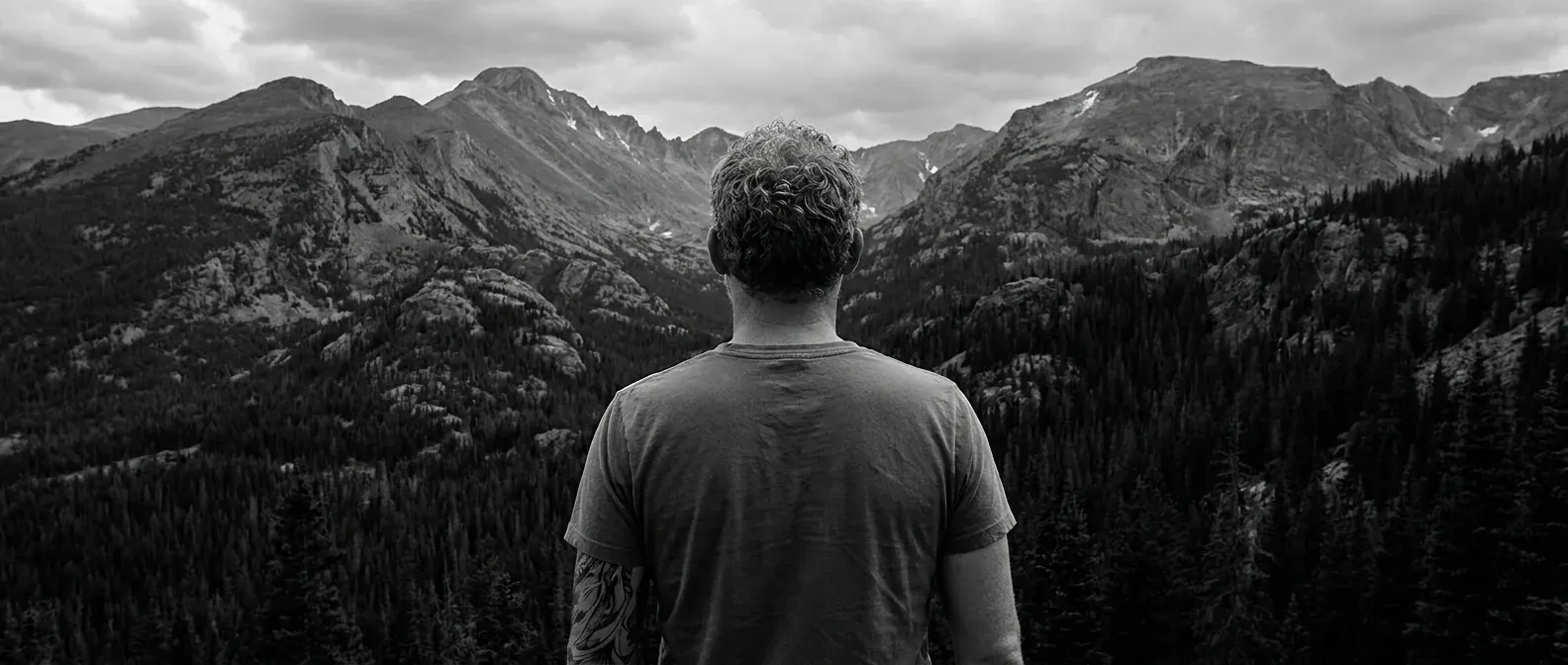 Looking out across a mountain range from a high ridgeline